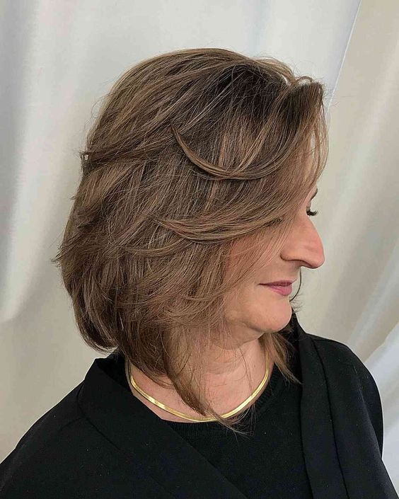 Asymmetrical Bob Medium Layered Bob Hairstyles for Women Over 50