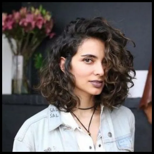 Medium-Length Curls with a Side Part